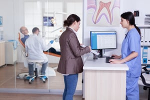 patients-asking-informations-filling-in-dental-doc-2023-11-27-05-01-26-utc